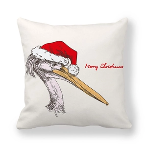 Dettaglio federa natalizia in pelle di pesca con renna e scritta rossa Merry Christmas