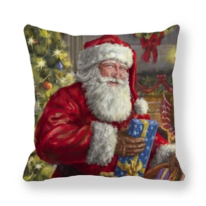 Détail d'une taie d'oreiller en peau de pêche avec imprimé peinture de Père Noël
