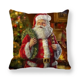 Détail de la housse de coussin style peinture à l'huile avec Père Noël et couronne