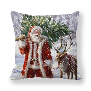 Détail de la taie d'oreiller en peau de pêche avec imprimé Père Noël et renne