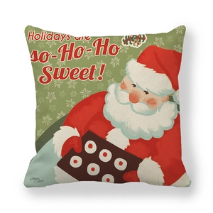 Detail of Christmas pillow cover showing Santa with cookies and festive holiday text