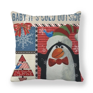 Close-up of Christmas penguin and tree print on high-quality peach skin pillow cover