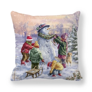 Christmas peach skin pillowcase featuring kids building a snowman in a winter forest