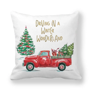 Detail of Christmas pillow cover with watercolor red truck and winter wonderland text