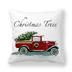 Detailed close-up of a Christmas tree delivery truck print on peach skin pillowcase