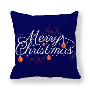 Detail of navy blue peach skin pillowcase with Merry Christmas print and holiday ornaments