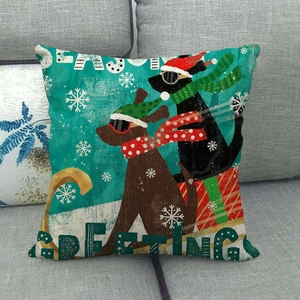 Christmas dog themed linen throw pillow cover with festive greetings on a grey sofa