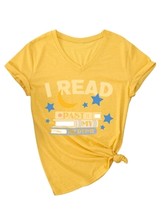 Detail of yellow V-neck tee featuring I Read Past My Bedtime print and knotted hem