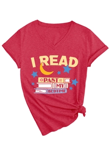 Detail of red V-neck T-shirt with I READ PAST MY BEDTIME print and knotted hem