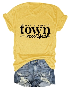 Ginger yellow cotton T-shirt with 'small town nurse' text paired with denim shorts