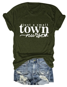 Flat lay of a dark green cotton t-shirt with nurse print and ripped denim shorts