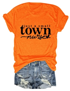 Orange graphic T-shirt with Just a Small Town Nurse print and distressed denim shorts