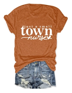 Flat lay of rust red cotton t-shirt with nurse print and frayed denim shorts set