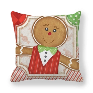 Close-up of gingerbread man pattern on peach skin Christmas pillow cover with dot patterns