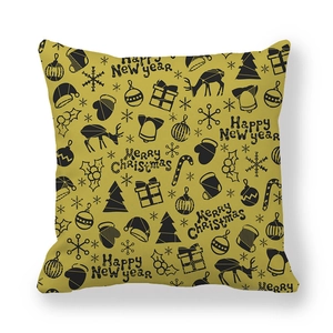 Detail showing Christmas reindeer and tree patterns on mustard yellow cushion cover