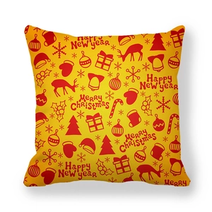 Close-up of yellow peach skin pillowcase featuring red Christmas and New Year prints