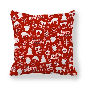 Red Christmas pillow cover with white reindeer and snowflake patterns for holiday decor