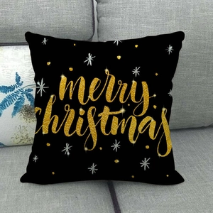 Détail de la taie d'oreiller de Noël avec texte Merry Christmas doré sur lin noir