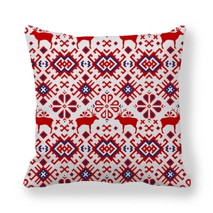 Detailed view of Christmas reindeer and snowflake patterns on peach skin pillowcase