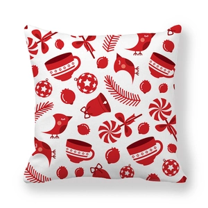 Detailed view of Christmas pillowcase with red festive patterns on white peach skin fabric