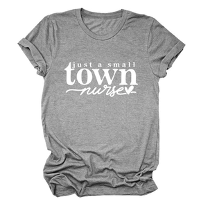 Close-up of grey heather cotton T-shirt featuring just a small town nurse white print