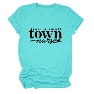 Detail of turquoise t-shirt featuring just a small town nurse print and rolled sleeves