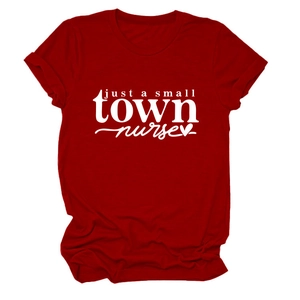 Flat lay of a red cotton nurse t-shirt with just a small town nurse white print