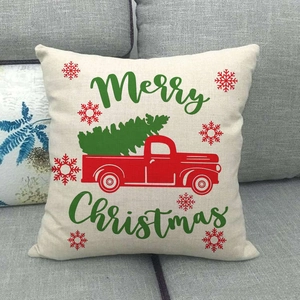 Linen Christmas pillowcase featuring a classic red truck and Merry Christmas text on a sofa