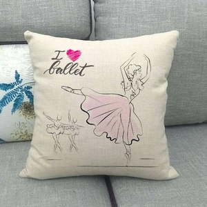 Linen ballet dancer pillow cover with I heart ballet sketch on a grey sofa
