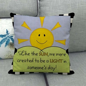Square linen pillow cover with cartoon sun, purple green color block, and quotes