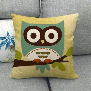 Close-up of linen fabric texture and cartoon owl design on a square throw pillow cover