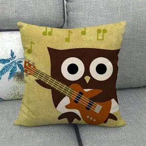Close-up of linen pillowcase with cartoon owl playing guitar and green musical notes