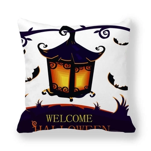 Close-up of Halloween peach skin pillowcase with vintage lantern and bat print details