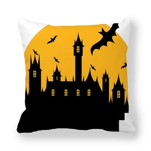 Detail view of Halloween pillowcase featuring a yellow moon and black gothic castle silhouette