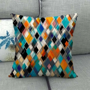 Close-up of linen cushion cover featuring vibrant geometric diamond patterns on a sofa