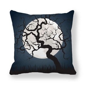 Macro detail of Halloween pillow case showing spooky silhouette tree and full moon pattern