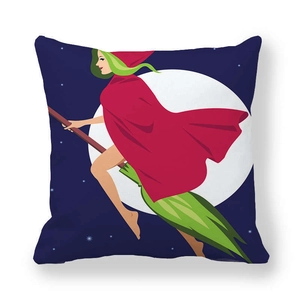 Detail of Halloween pillowcase with cartoon witch flying across a full moon and starry night sky