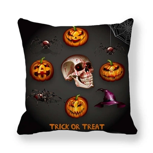 Close-up of Halloween pillowcase with pumpkins, skull, and Trick or Treat typography