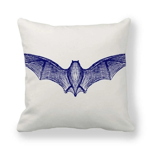 Close-up of thick peach skin fabric featuring a hand-drawn bat illustration on a pillowcase