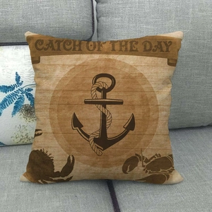 Nautical linen pillow case with anchor print on vintage wood texture background