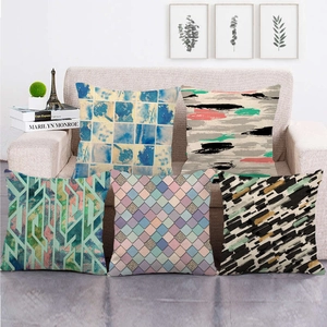 Set of five geometric linen pillow covers featuring colorful abstract watercolor patterns