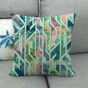 Macro detail of breathable linen pillowcase showing textured geometric mint green patterns