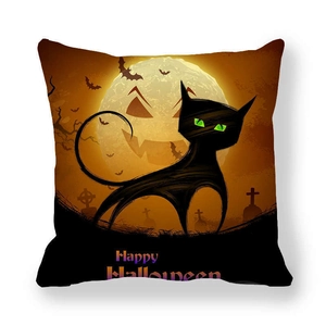 Close-up of Halloween peach skin pillowcase with black cat, moon and bats motif