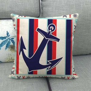Nautical anchor square cushion cover with red and blue stripes on gray sofa