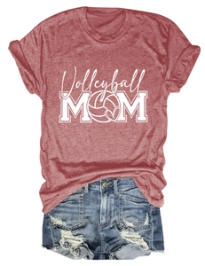Flat lay of a heather red Volleyball Mom T-shirt paired with denim shorts for women