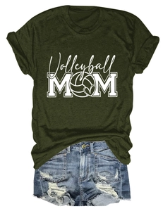 Flat lay of an olive green Volleyball MOM t-shirt paired with distressed denim shorts