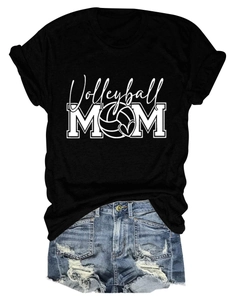 Flat lay of black cotton Volleyball MOM t-shirt paired with distressed denim shorts