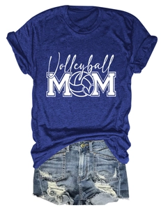 Flat lay of navy Volleyball Mom T-shirt and distressed denim shorts summer outfit
