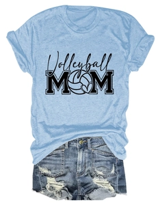 Close-up of light blue T-shirt fabric with Volleyball MOM print and denim shorts