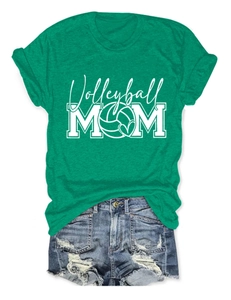 Close-up of vibrant green Volleyball Mom T-shirt with white graphic print and heart logo